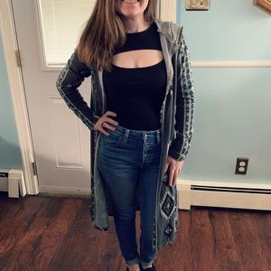 Small black forever 21 ribbed long sleeved cut out body suit. Used excellent con